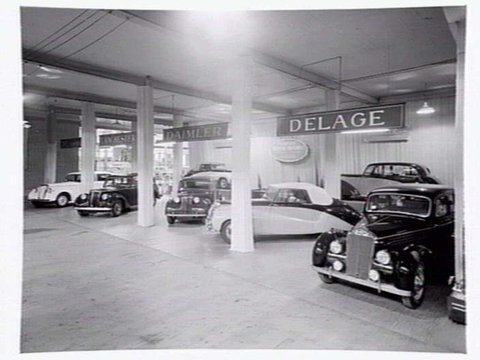 Car display, shows cars from Jouberts British Motors, 566 Bourke Street, Melbourne, 1948–54