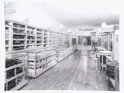 McLeod's Mens Store, corner Royal Arcade & Bourke St, window display and ground floor interior, c. 1946
