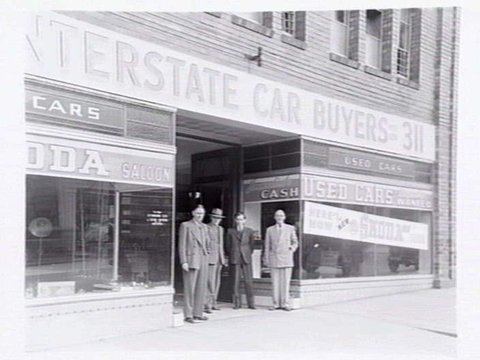 Interstate Car Buyers, 307-311 La Trobe St., Melbourne, showing exterior and Skoda car display inside, 1949