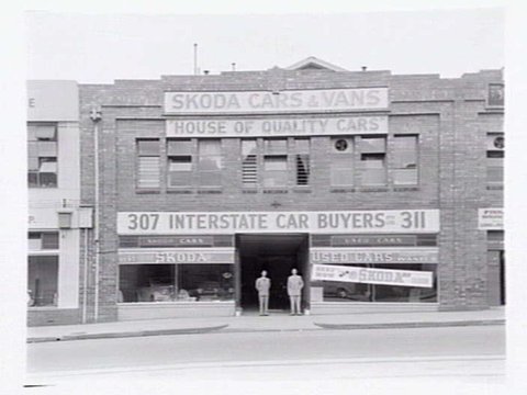 Interstate Car Buyers, 307-311 La Trobe St., Melbourne, showing exterior and Skoda car display inside, 1949