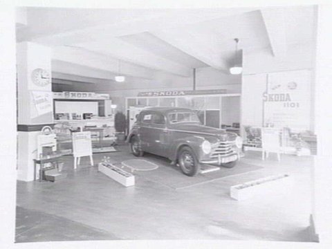 Interstate Car Buyers, 307-311 La Trobe St., Melbourne, showing exterior and Skoda car display inside, 1949