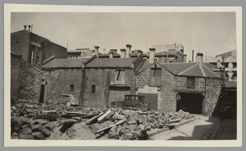 Demolition of the Standard Hotel, cnr. Little Collins and Exhibitions Streets, Melbourne, 1937