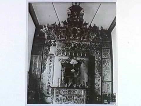 In Chinese Joss House, in Quiet [sic] [i.e. Raglan] Street, South Melbourne, Vic, c. 1940