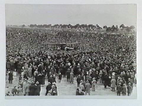 Mr Alan Cobham and [illegible] Ward just landed at Essendon Aerodrome, Melbourne, 1931