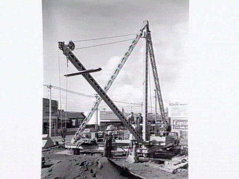 Crane excavating at Glenhuntly Rd. Caulfield, 1953