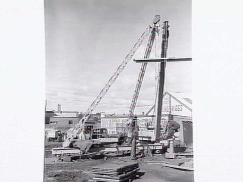 Crane excavating at Glenhuntly Rd. Caulfield, 1953