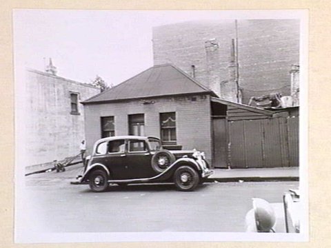 Little Lonsdale Street - north side, at corner with Finn Place, 1950