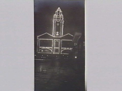 Flinders Street Station illuminated for visit of Prince of Wales, 1920