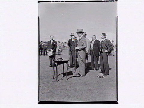 Presentation of Melbourne Cup trophy at Flemington Racecourse, 1949