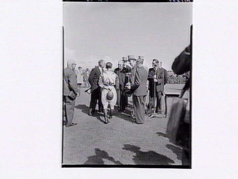 Presentation of Melbourne Cup trophy at Flemington Racecourse, 1949