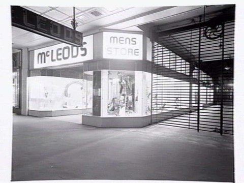 Window displays at McLeod's Mens Store, 335 Bourke Street, Melbourne, corner of Royal Arcade, 1946?