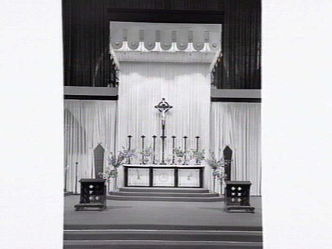 Interior of Exhibition Buildings set up as a church for public masses to celebrate the centenery of the Melbourne Catholic Diocese, 1948