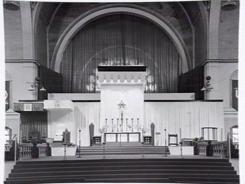 Interior of Exhibition Buildings set up as a church for public masses to celebrate the centenery of the Melbourne Catholic Diocese, 1948