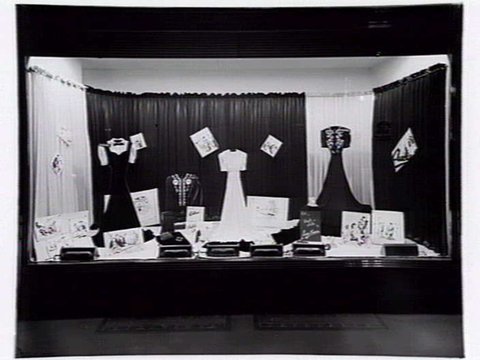 Lucy Secor Frock Salon, 280 Collins Street display window, taken during the day and at night, 1941?