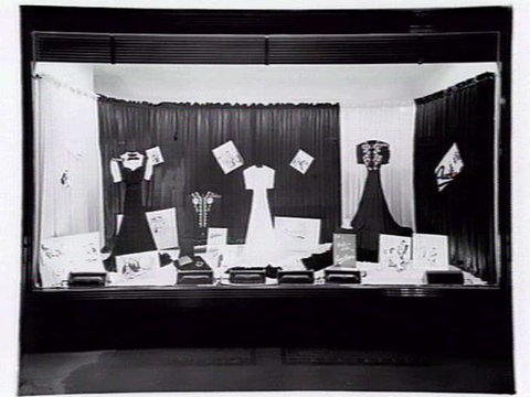 Lucy Secor Frock Salon, 280 Collins Street display window, taken during the day and at night, 1941?