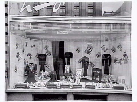 Lucy Secor Frock Salon, 280 Collins Street display window, taken during the day and at night, 1941?