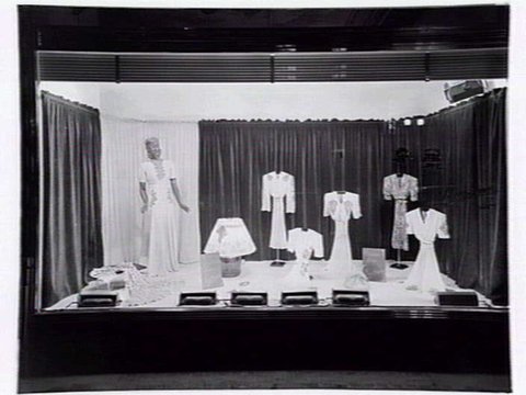 Lucy Secor Frock Salon, 280 Collins Street display window, taken during the day and at night, c. 1941