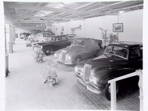 Motor car display by Neal's Motors, at the Royal Melbourne Show Grounds, 1949