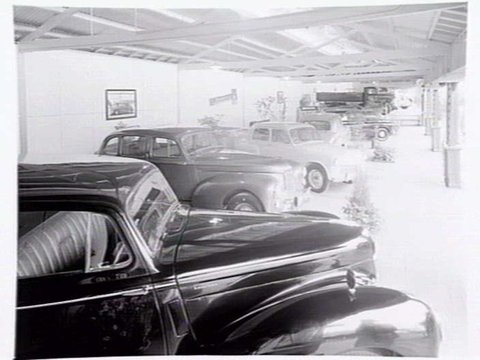 Motor car display by Neal's Motors, at the Royal Melbourne Show Grounds, 1949