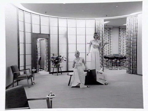 Julius Kayser & Co., 2nd floor, 328-42 Flinders Lane, Melbourne, showing small theatrette for mannequin displays, outer showroom area with display of Kayser sleeping gowns and office area, 1949