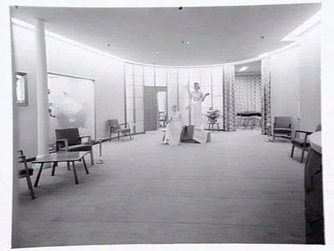 Julius Kayser & Co., 2nd floor, 328-42 Flinders Lane, Melbourne, showing small theatrette for mannequin displays, outer showroom area with display of Kayser sleeping gowns and office area, 1949