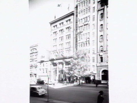 Commonwealth Bank in Collins Street decorated for the Royal visit, 1954