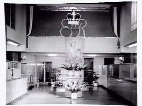 Commonwealth Bank in Collins Street decorated for the Royal visit, 1954