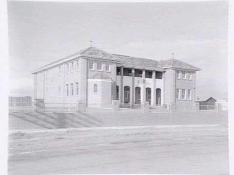 St. Vincent de Paul Girls' Orphanage, Napier St., South Melbourne, showing exterior views, girls in quadrangle and interiors of chapel, dining room and kitchen, c. 1940