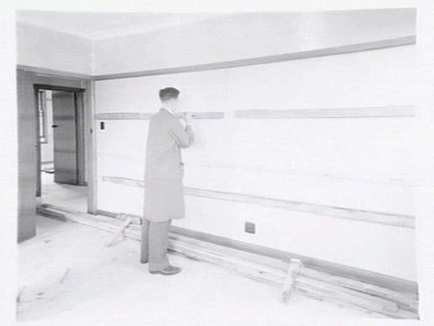 Housing Commission of Victoria pre-fabricated timber houses, showing construction in kitchen, bathroom and laundry, transfer of sections to building sites and positioning of houses on blocks at Sandringham Estate, 1949