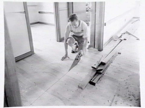 Housing Commission of Victoria pre-fabricated timber houses, showing construction in kitchen, bathroom and laundry, transfer of sections to building sites and positioning of houses on blocks at Sandringham Estate, 1949