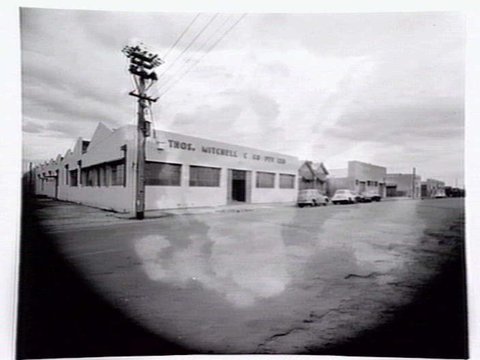 Thomas Mitchell & Son brushwear products, including broom heads, mops, straw brooms, paint brushes, feather dusters, scrubbing brushes and view of premises at 120-152 Victoria St., Brunswick, 1952