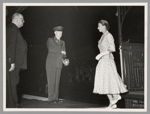 Queen Elizabeth at Flinders Street Railway Station at night, 1954