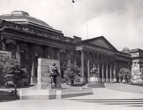 Forecourt of the Public Library of Victoria (later State Library of Victoria) from the corner of Latrobe and Swanston streets, 1951