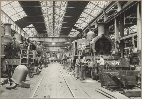 Newport Shops. [Interior, men working on engine.], 1928