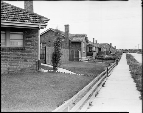 Street view of one side of a road in a Housing Commission estate, Coburg, Preston and Heidelberg area, c. 1947