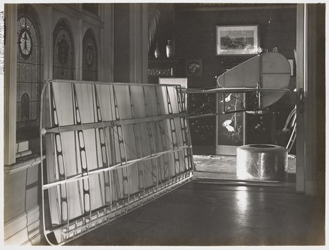 "Basil Watson assembling his aeroplane in his parents' house in St. Kilda Street, Elsternwick", c. 1917