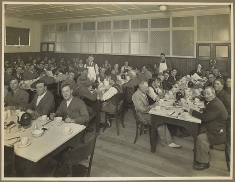 Men at tea break in Men's Dining Room at Bryant & May, Richmond, 1920–30