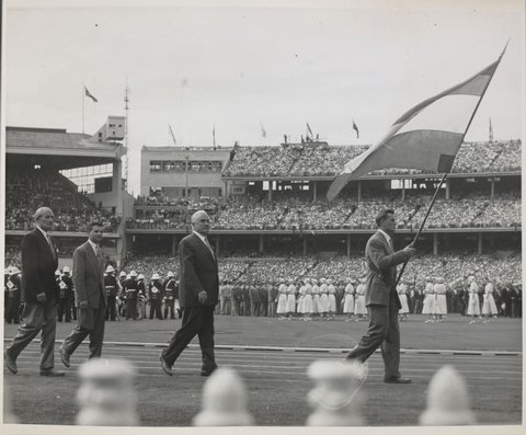Team marching at opening ceremony of Melbourne Olympic Games, 1956