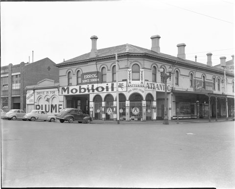 Errol Service Station, 1 Errol Street North Melbourne, with Plume and Mobiloil advertisements, c. 1951