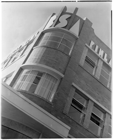 Corner signage, Finlay Bros. Motorcycles Shop and Bry-Law Motors, 316-324 Elizabeth Street, Melbourne, c. 1941