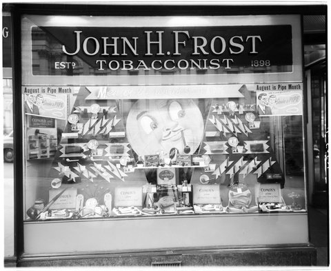 Shop window, John H. Frost, tobacconist and hairdresser, 340 Collins Street, c. 1952