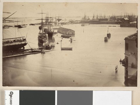 [Flinders St. and wharves under water from top of Custom House.], c. 1863