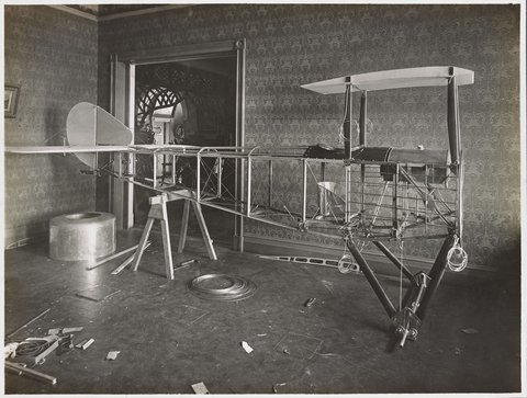 "Basil Watson assembling his aeroplane in his parents' house in St. Kilda Street, Elsternwick", c. 1917