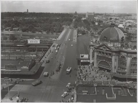 Elevated view of Flinders Street Station and St. Kilda Road, Melbourne, Victoria, 1946–54