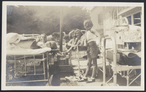 Children in hospital beds on lawn at the Children's Orthopaedic Hospital, Frankston, 1937