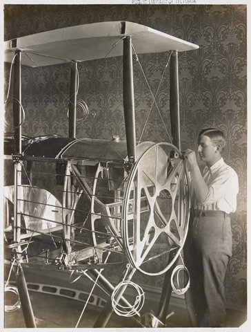 "Basil Watson assembling his aeroplane in his parents' house in St. Kilda Street, Elsternwick", c. 1917