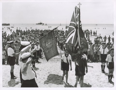 Sea Scouts carry the Australian flag at the Australia Day ceremony at Frankston, c. 1953