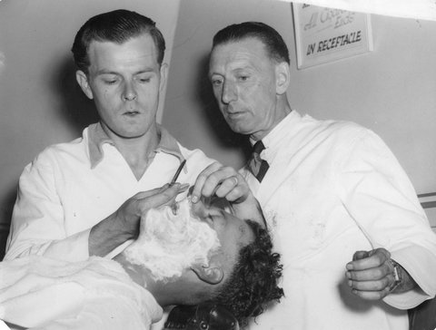 Mr. F. L. Loord of West Melbourne Technical School rehabilitation centre instructing a returned serviceman, c. 1946