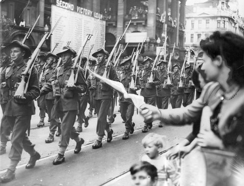 4th and 15th Brigades A.I.F. march past Melbourne Town Hall, c. 1944