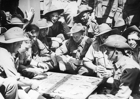 Group of A.I.F. men playing cards on their arrival in the transport ready for embarking from Port Melbourne, c. 1940